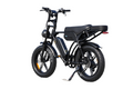 Rider on electric bike with double battery setup, designed for daily commuting, weekend trips, and extended range performance.